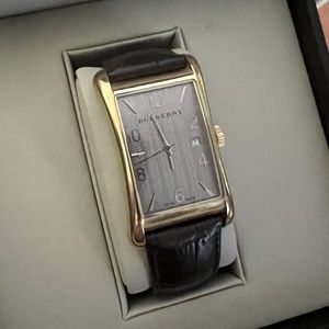 Men’s gold Burberry watch